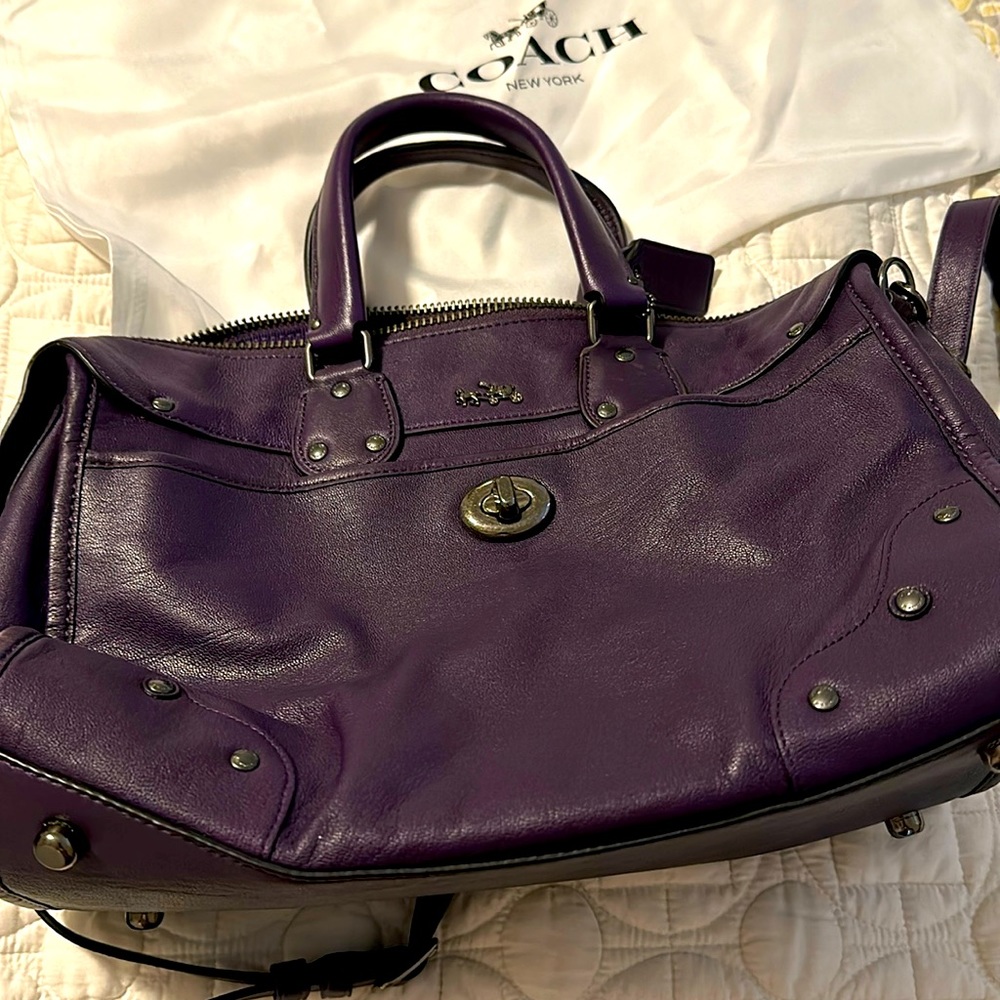 Coach handbag. Dark purple with nickel hardware and details. Excellent condition